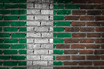 Image showing Brick wall texture with flag