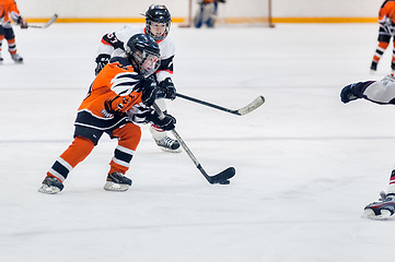 Image showing Game between children ice-hockey teams