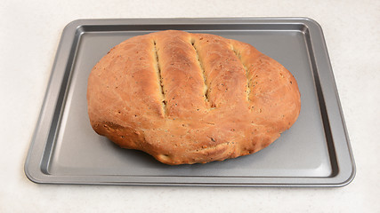 Image showing Freshly-baked bread, hot from the oven