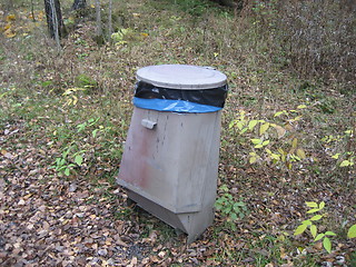 Image showing Lonely garbage container in the forest