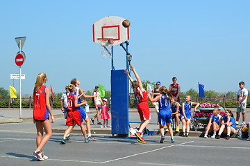 Image showing Street basketball among women's teams on the street in Tyumen, R