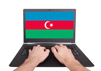 Image showing Hands working on laptop, Azerbaijan