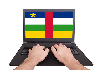 Image showing Hands working on laptop, Central African Republic