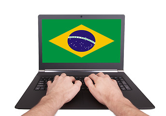 Image showing Hands working on laptop, Brazil