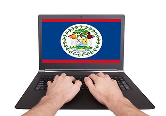 Image showing Hands working on laptop, Belize