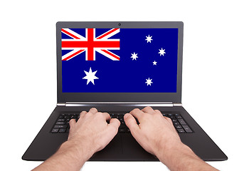 Image showing Hands working on laptop, Australia