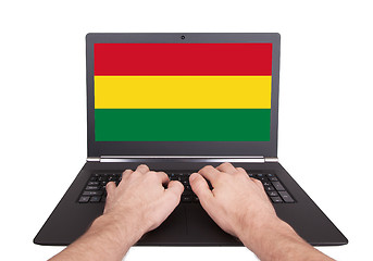 Image showing Hands working on laptop, Bolivia