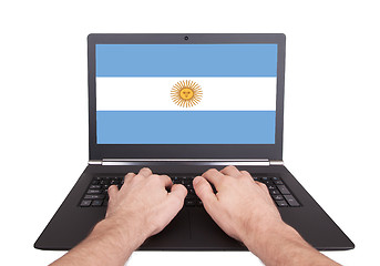 Image showing Hands working on laptop, Argentina