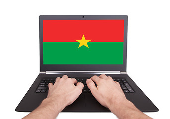 Image showing Hands working on laptop, Burkina Faso