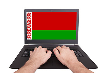 Image showing Hands working on laptop, Belarus