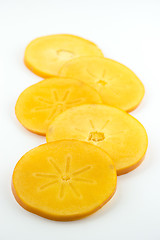 Image showing orange persimmon slices 