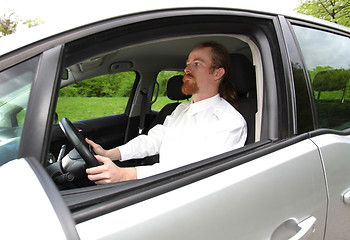Image showing Man driving his car on road