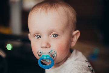 Image showing Pretty Baby Boy With Soother