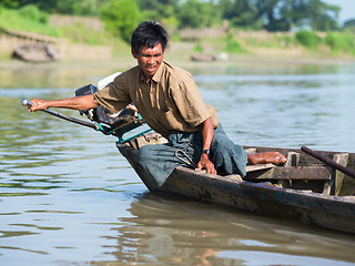 Image showing Burmese helmsman on the Lemro River