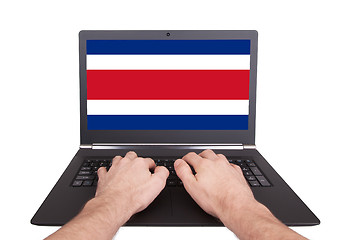 Image showing Hands working on laptop, Costa Rica