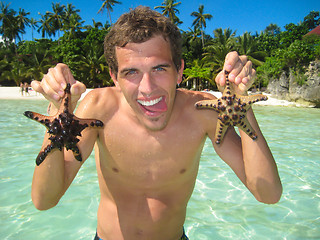 Image showing Man having fun on the beach.