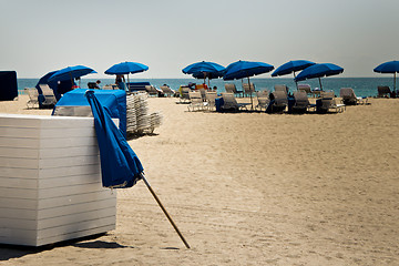 Image showing Sun umbrellas on a sandy beach