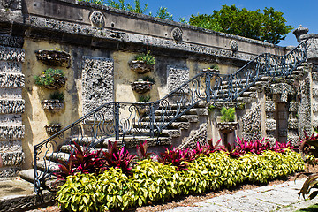 Image showing Old, ornate staircase with flowers