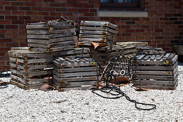 Image showing Vintage lobster traps on the shore