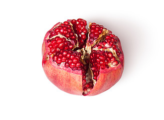 Image showing Broken Bright Ripe Delicious Juicy Pomegranate Top View