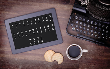 Image showing Braille on a tablet, concept of impossibility