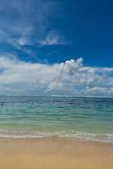 Image showing Beautiful tropical beach with lush vegetation