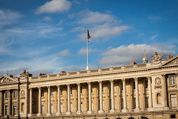 Image showing Flag of France fluttering under a serene blue sky