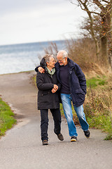 Image showing happy mature couple relaxing baltic sea dunes 