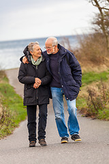 Image showing happy mature couple relaxing baltic sea dunes 