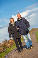 Image showing happy mature couple relaxing baltic sea dunes 