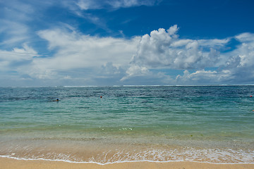 Image showing Beautiful tropical beach with lush vegetation