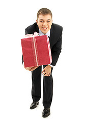 Image showing happy businessman with pink gift package