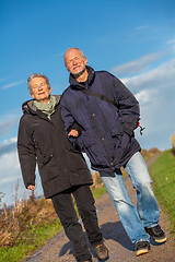 Image showing happy mature couple relaxing baltic sea dunes 