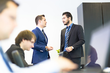 Image showing Business people in modern office.