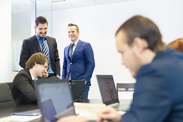 Image showing Business people in modern office.