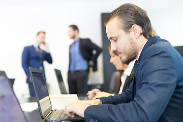 Image showing Business people in modern office.