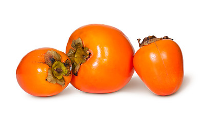 Image showing Three Whole Persimmons