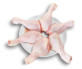 Image showing Raw Chicken Legs As A Star On White Plate