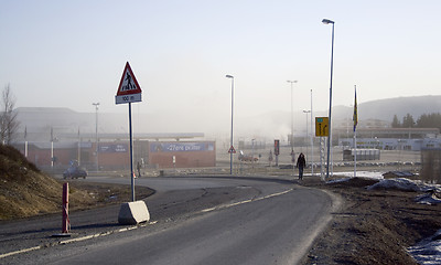 Image showing walking by a dusty road