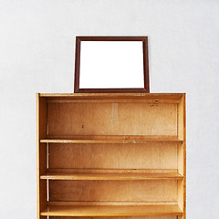 Image showing Wooden book Shelf and photo frame