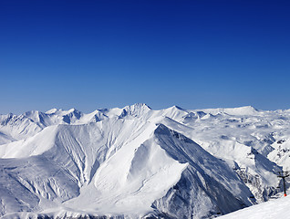 Image showing Winter mountains and blue clear sky at nice day