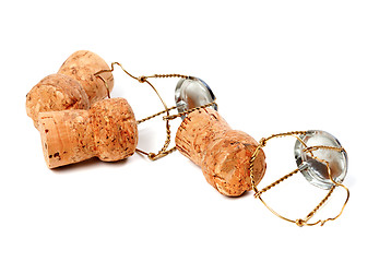 Image showing Three champagne wine corks and muselets 