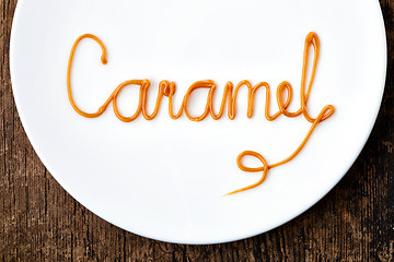 Image showing Word Caramel on white plate