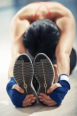 Image showing Stretching woman in exercising room