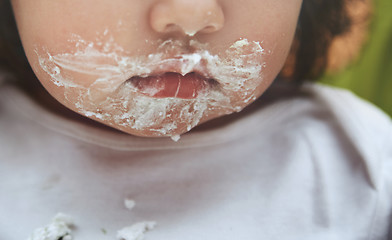 Image showing Baby with dirty mouth after eating