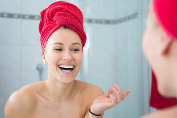 Image showing Girl in front of the mirror