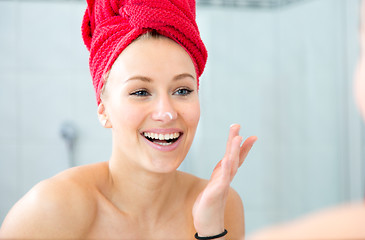 Image showing Girl in front of the mirror