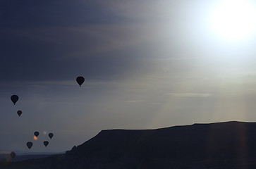 Image showing Silhouette of air balloons in the sky