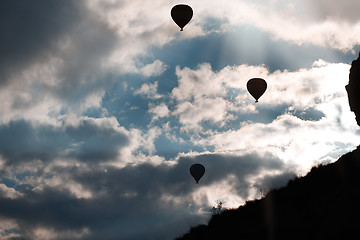 Image showing Silhouette of air balloons in the sky