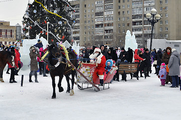 Image showing Festive drivings on sledge with Father Frost.